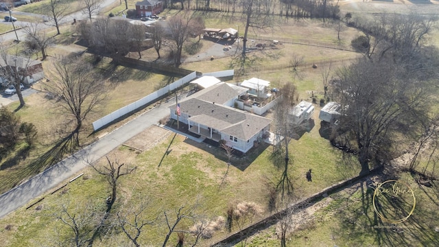 birds eye view of property with a rural view