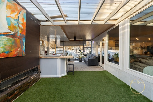 exterior space featuring carpet floors