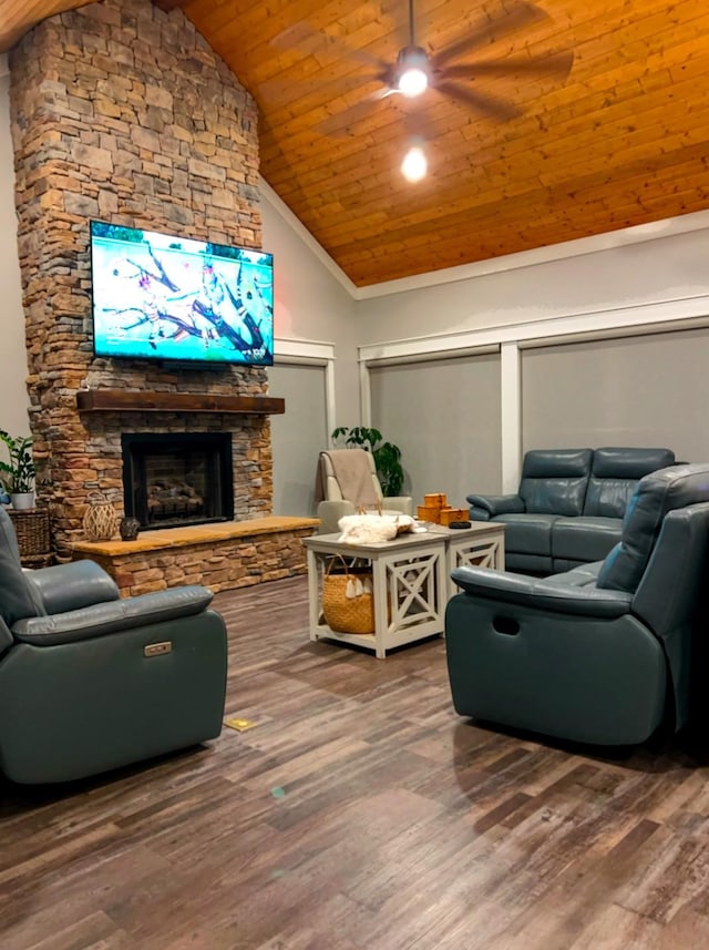 living room featuring wood ceiling, high vaulted ceiling, a fireplace, and hardwood / wood-style floors