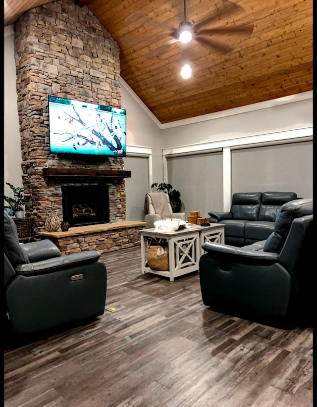 living room featuring wood ceiling, wood-type flooring, a fireplace, and high vaulted ceiling