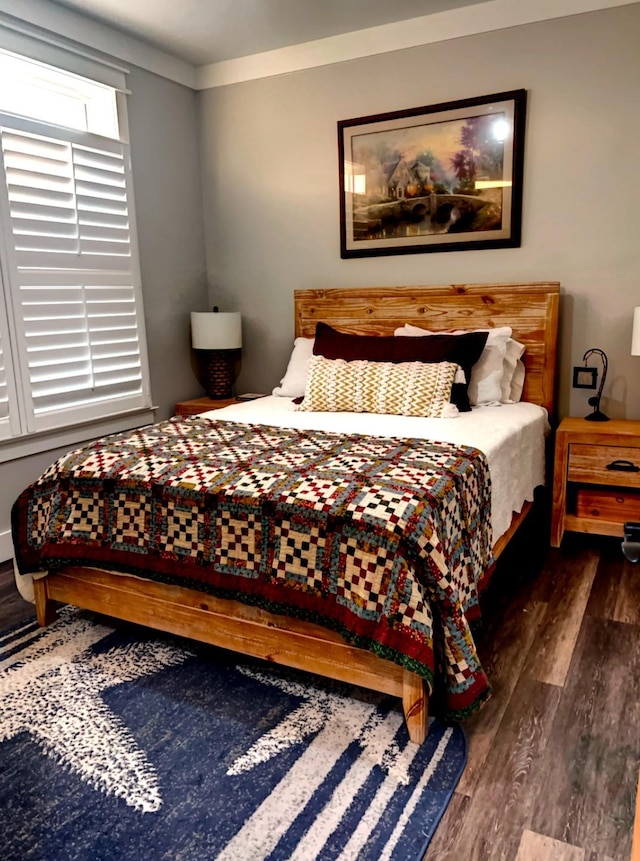 bedroom featuring dark hardwood / wood-style floors