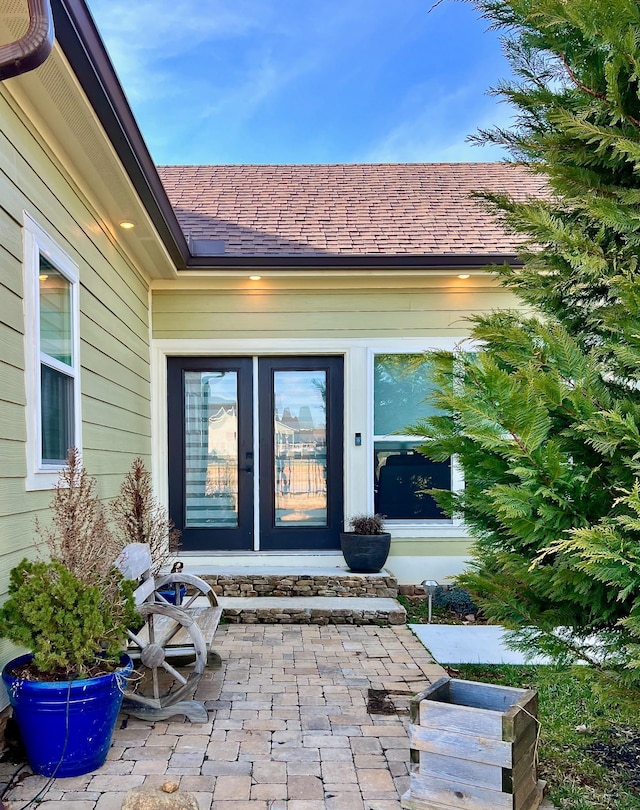 property entrance with french doors and a patio