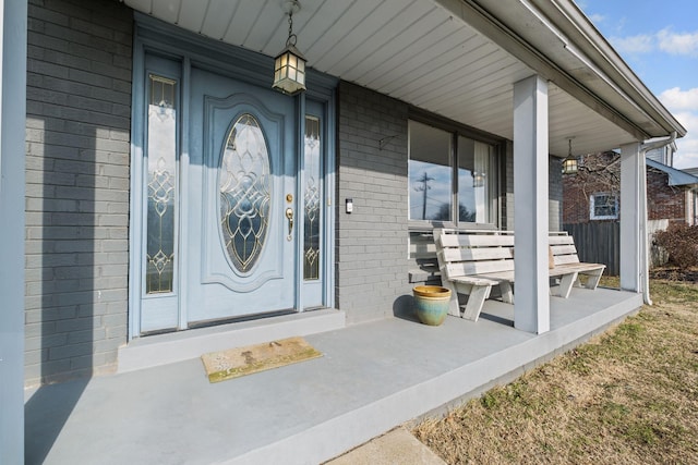 doorway to property featuring a porch