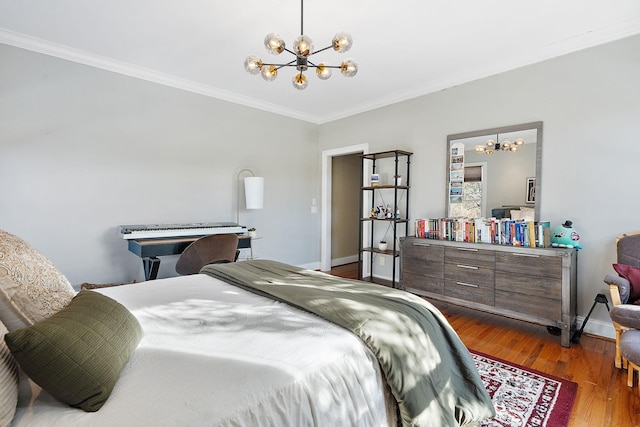 bedroom with crown molding, dark hardwood / wood-style floors, and a notable chandelier