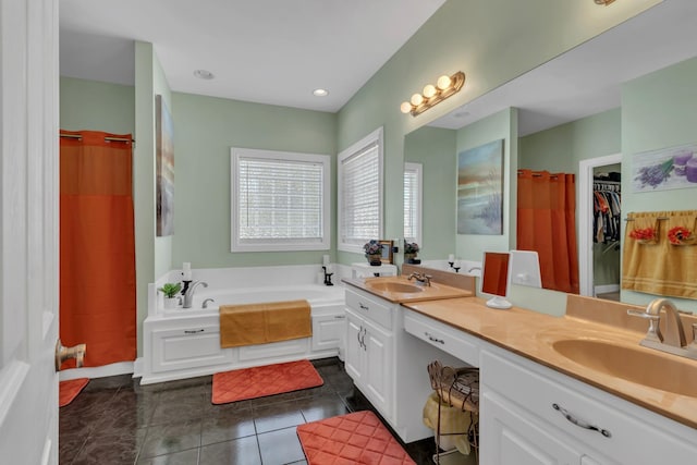 bathroom with tile patterned floors, vanity, and plus walk in shower