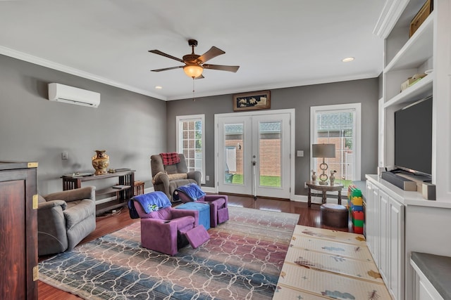 interior space featuring french doors, crown molding, dark hardwood / wood-style floors, a wall unit AC, and ceiling fan