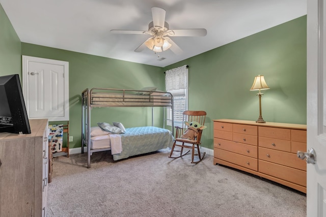 bedroom with light colored carpet and ceiling fan