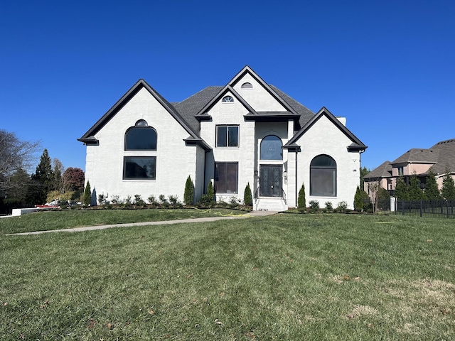 view of front of home featuring a front lawn