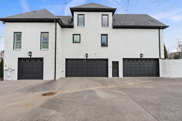 exterior space with a garage