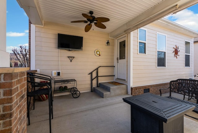 view of patio with ceiling fan