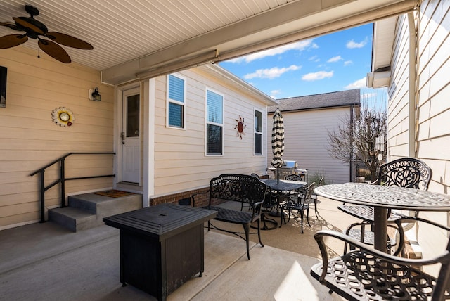 view of patio featuring ceiling fan