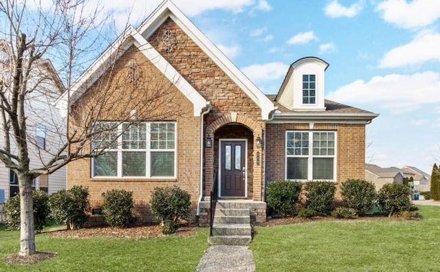 view of front of home with a front lawn