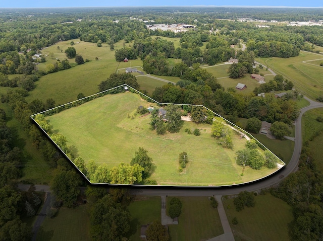 birds eye view of property featuring a rural view