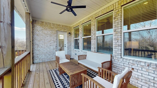 exterior space with a porch and ceiling fan