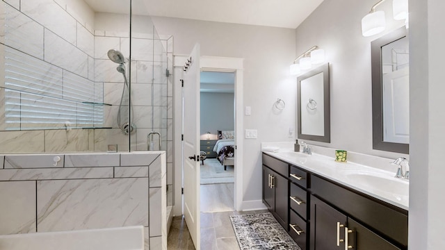 bathroom featuring vanity and a shower with shower door