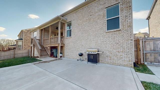 back of house featuring a patio and ceiling fan