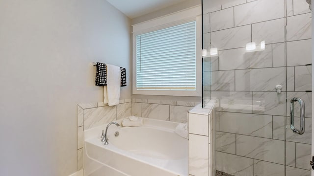 bathroom featuring plus walk in shower