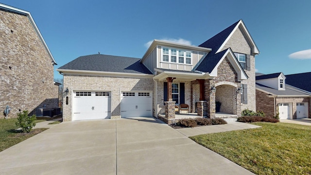 view of front of property with a front lawn and covered porch