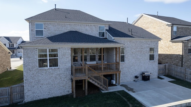 rear view of house with a patio area