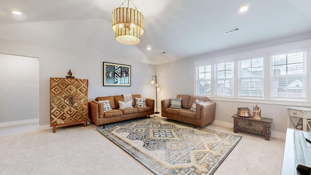 living room with lofted ceiling, an inviting chandelier, and carpet flooring