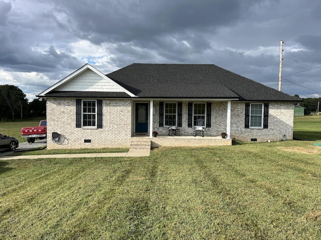 view of front of home featuring a porch and a front lawn