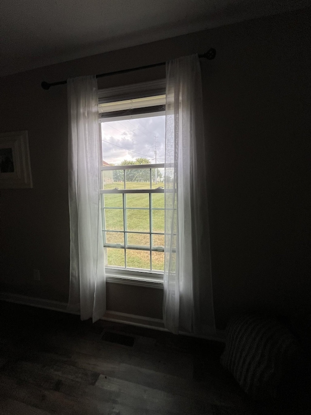 spare room featuring hardwood / wood-style flooring