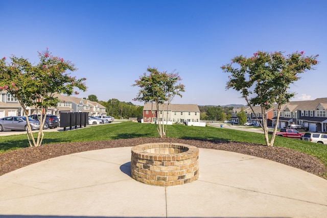 view of patio with an outdoor fire pit