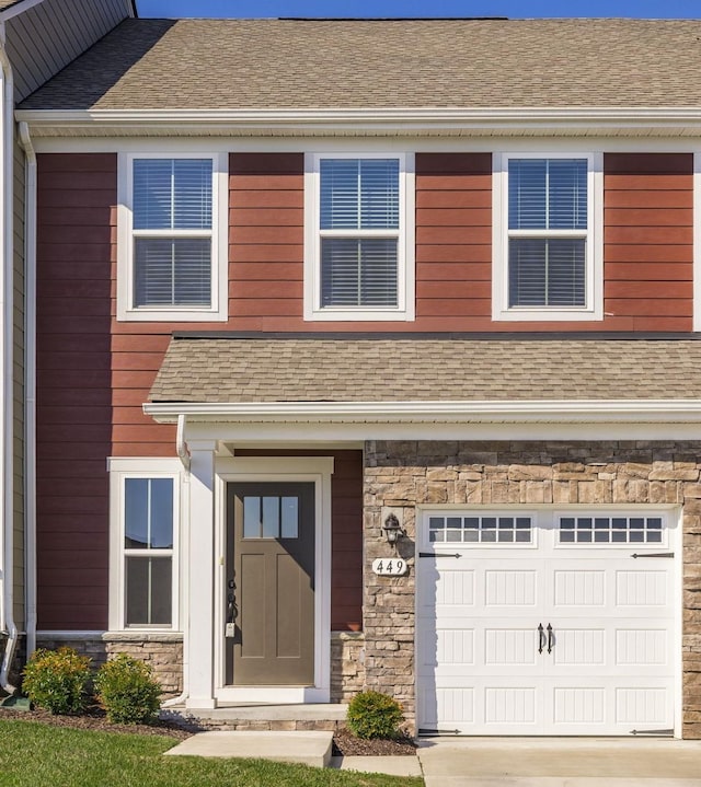 view of front of property with a garage