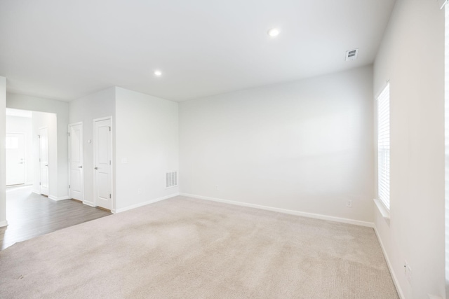 spare room with carpet flooring