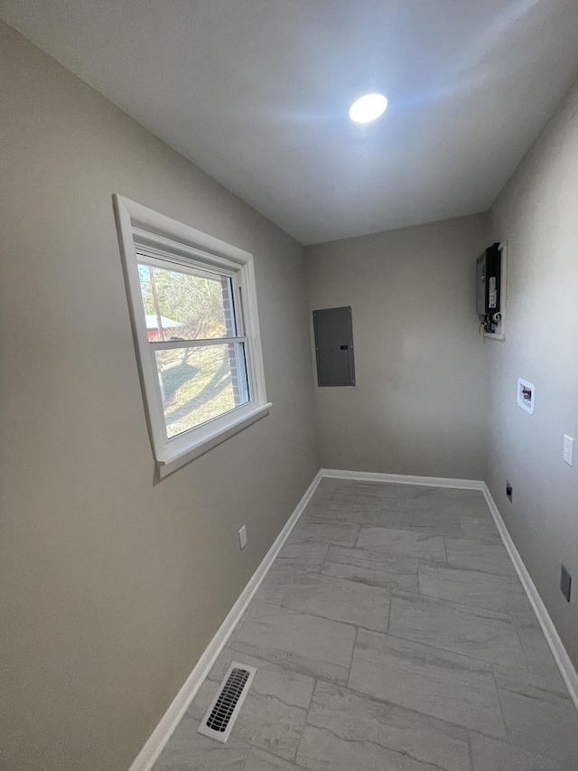 clothes washing area with baseboards, visible vents, laundry area, washer hookup, and marble finish floor