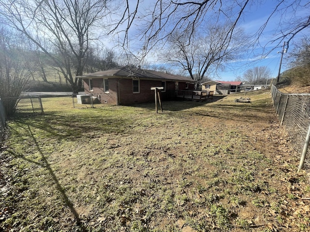 view of yard with a fenced backyard