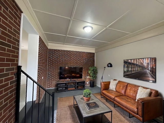 living room with brick wall