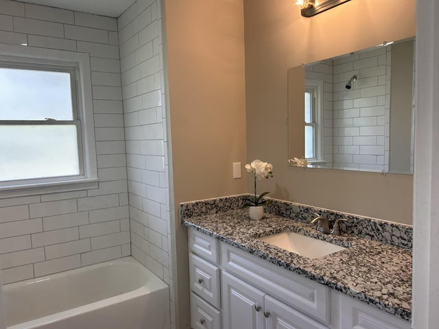 full bathroom featuring shower / bathtub combination and vanity