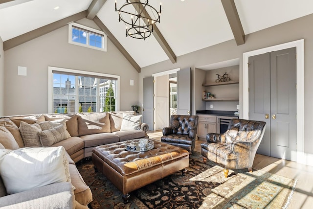 living room featuring beam ceiling, high vaulted ceiling, and a chandelier