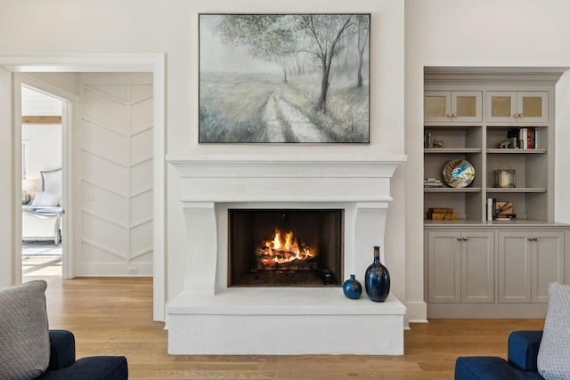 living room with light hardwood / wood-style flooring