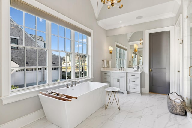 bathroom featuring an inviting chandelier, vanity, independent shower and bath, and high vaulted ceiling