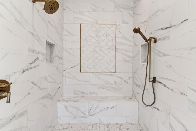 bathroom featuring tiled shower