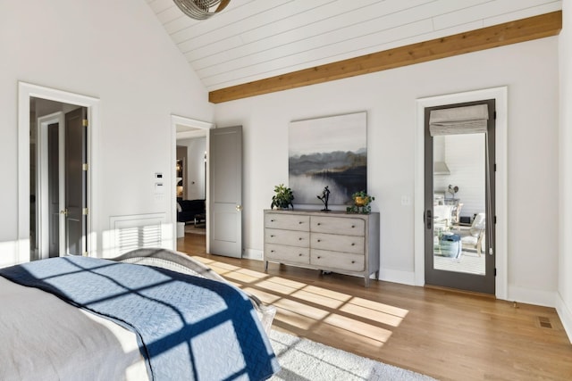 bedroom featuring wood ceiling, high vaulted ceiling, and light wood-type flooring