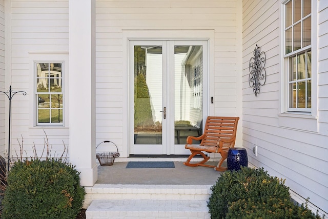 entrance to property featuring covered porch