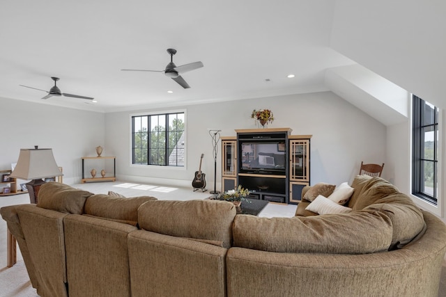 living room with vaulted ceiling, light carpet, and ceiling fan