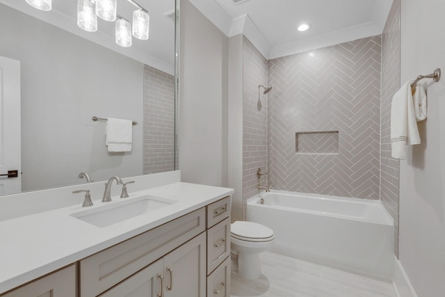 full bathroom featuring tiled shower / bath, tile patterned flooring, vanity, toilet, and crown molding