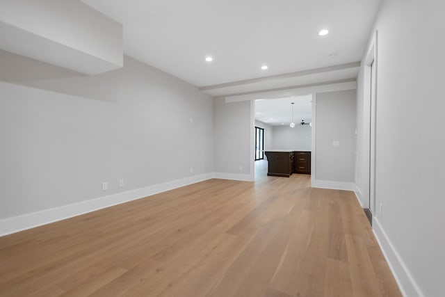 unfurnished living room featuring light wood-type flooring