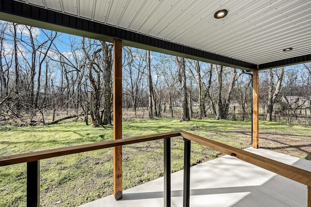 wooden deck with a patio area and a lawn