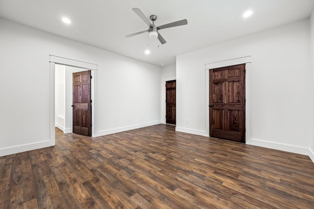 unfurnished bedroom featuring dark hardwood / wood-style floors and ceiling fan