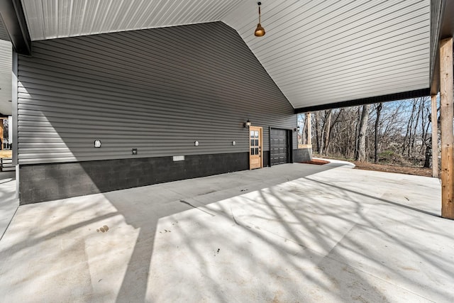 view of patio with a garage