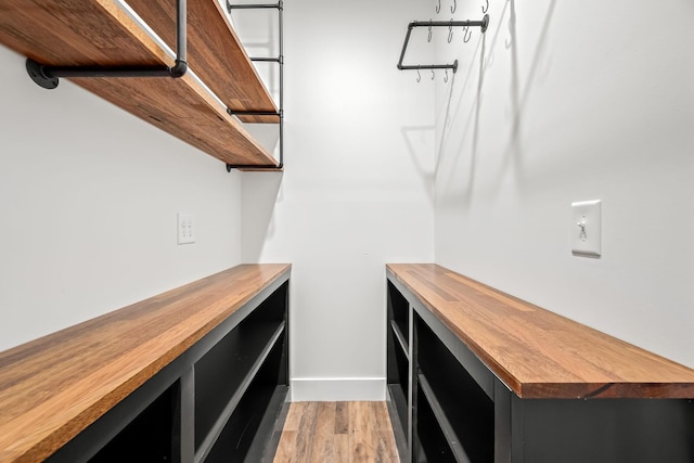 interior space featuring wood counters and light hardwood / wood-style flooring