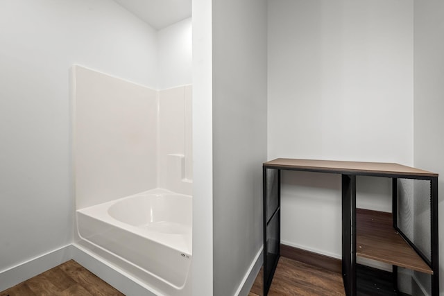 bathroom with hardwood / wood-style flooring