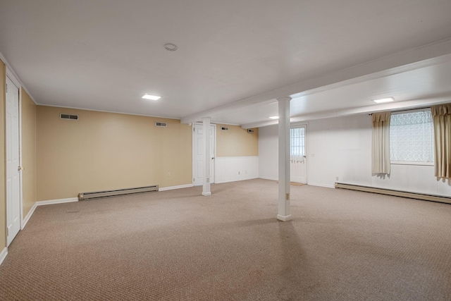 basement featuring carpet and baseboard heating