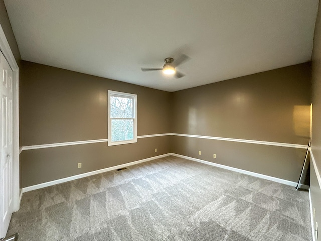 spare room with light carpet