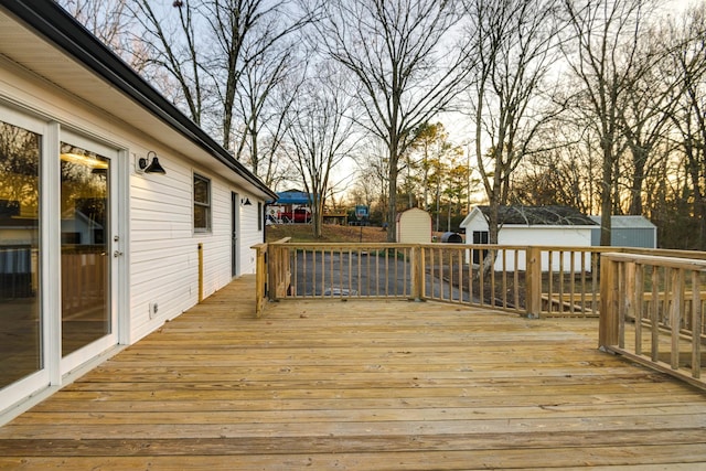 deck at dusk with a shed